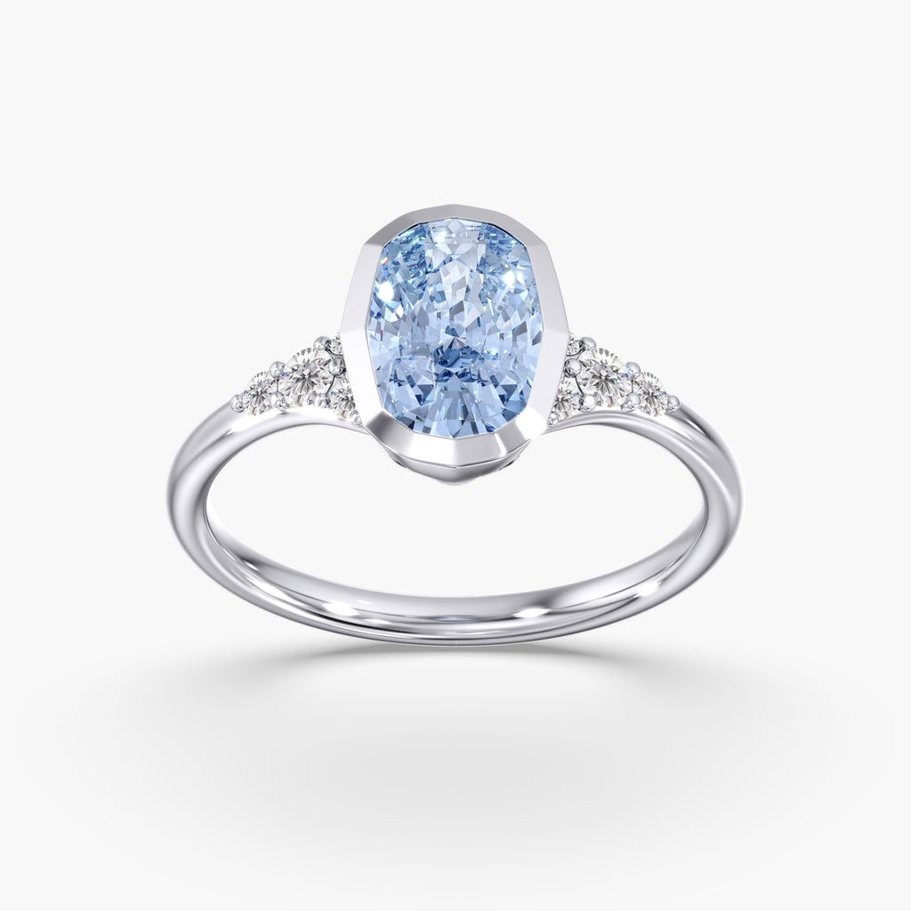 Artic Glow Elongated Cushion Blue Diamond Bezel Ring