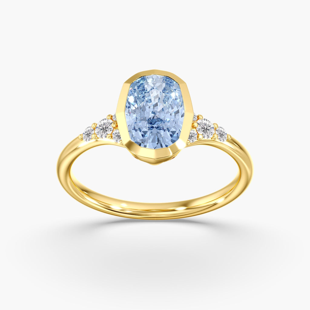 Yellow Gold Artic Glow Elongated Cushion Blue Diamond Bezel Ring