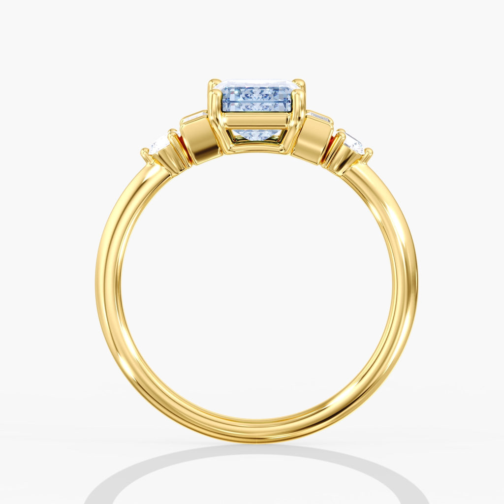 Yellow Gold Blue Emerald Cut 3 Stone Triangle Ring Side View