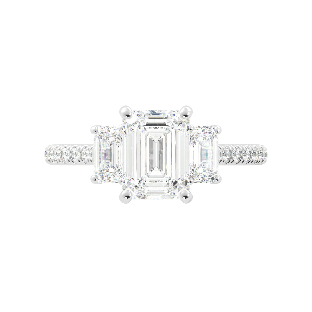 three stone engagement ring emerald cut