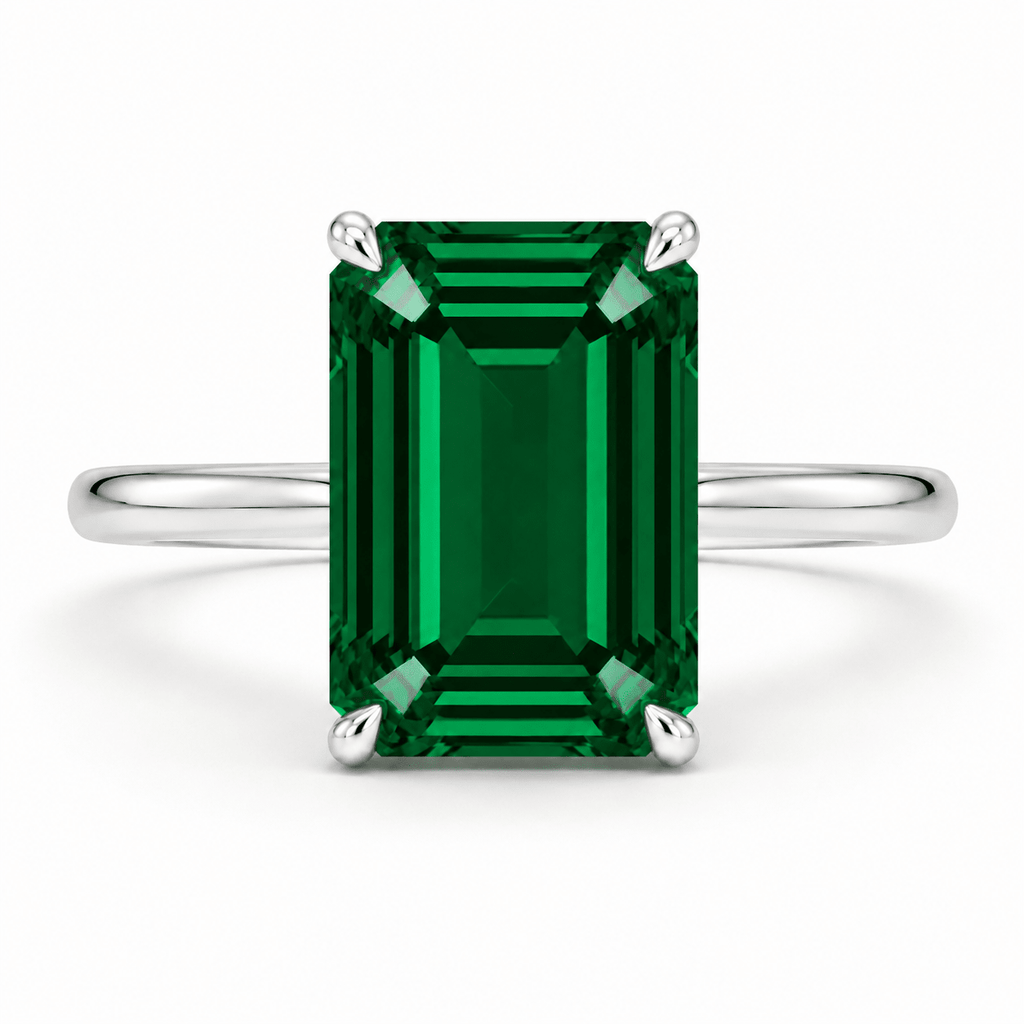 green emerald engagement ring silver white gold