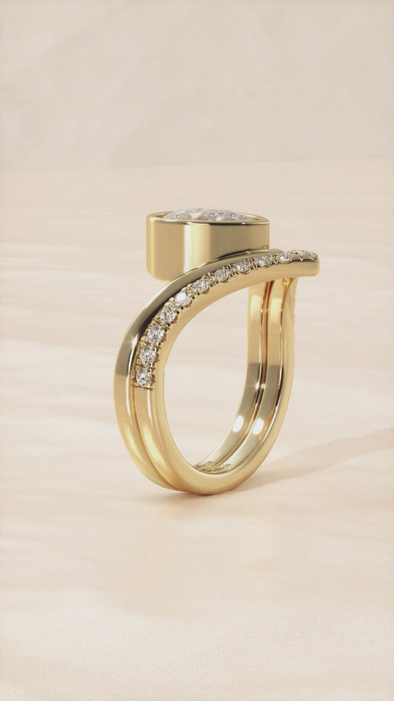 Gold Pear-Shaped Unique Ring with Bezel Setting