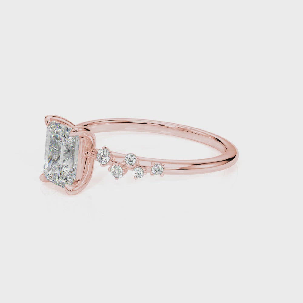 Costa Rica Emerald Cut Scattered Diamonds Engagement Ring