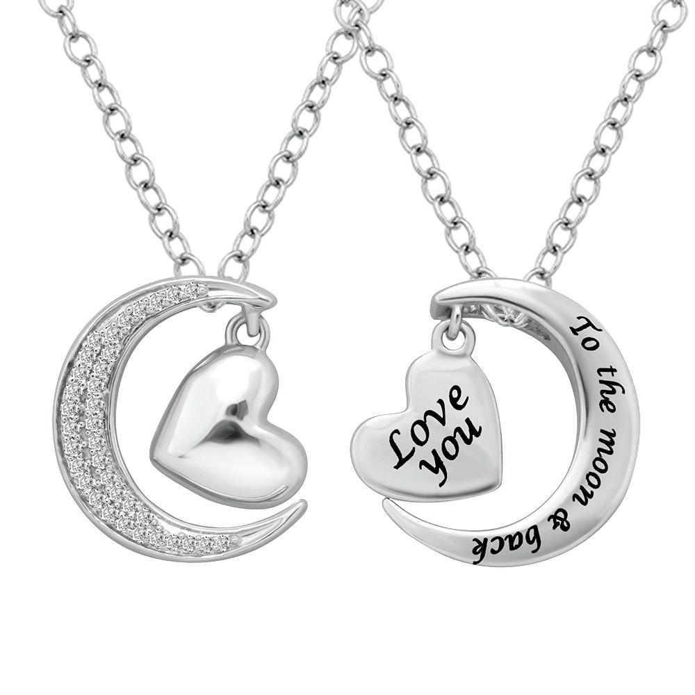 Sterling Silver 1/8 CTW Diamond Heart &amp; Moon Pendant