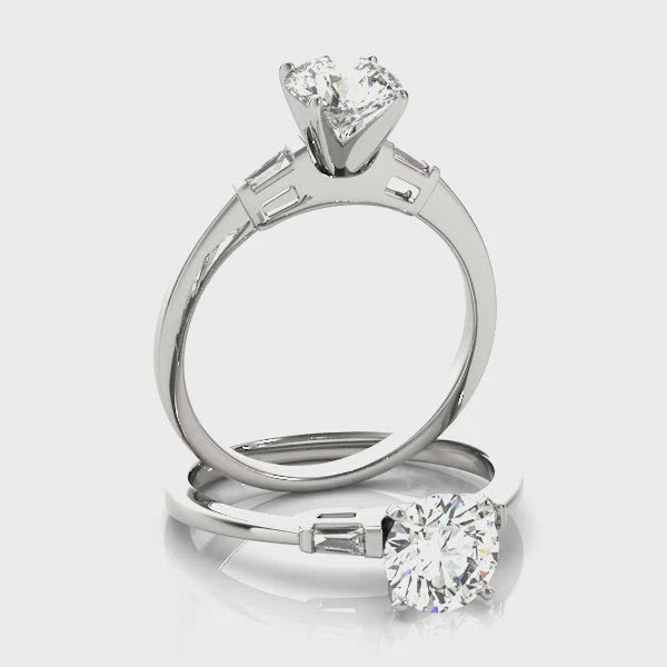 round diamond ring with baguette side stones