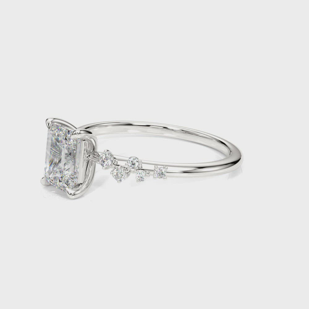 Costa Rica Emerald Cut Scattered Diamonds Engagement Ring
