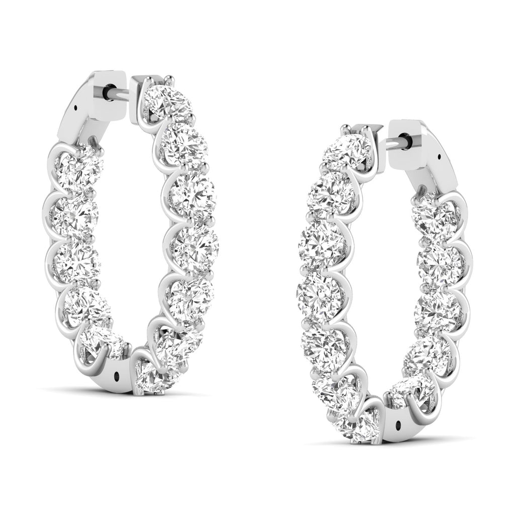 Mesmerizing diamond hoop earrings featuring sparkling diamonds set in high-quality metal, designed to create a captivating and elegant look for any occasion | White Gold | Side View