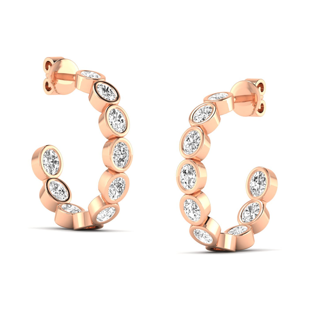 Elegant oval bezel diamond hoop earrings featuring radiant oval diamonds set in sleek bezel settings, offering a modern and sophisticated look | Rose Gold | Side View