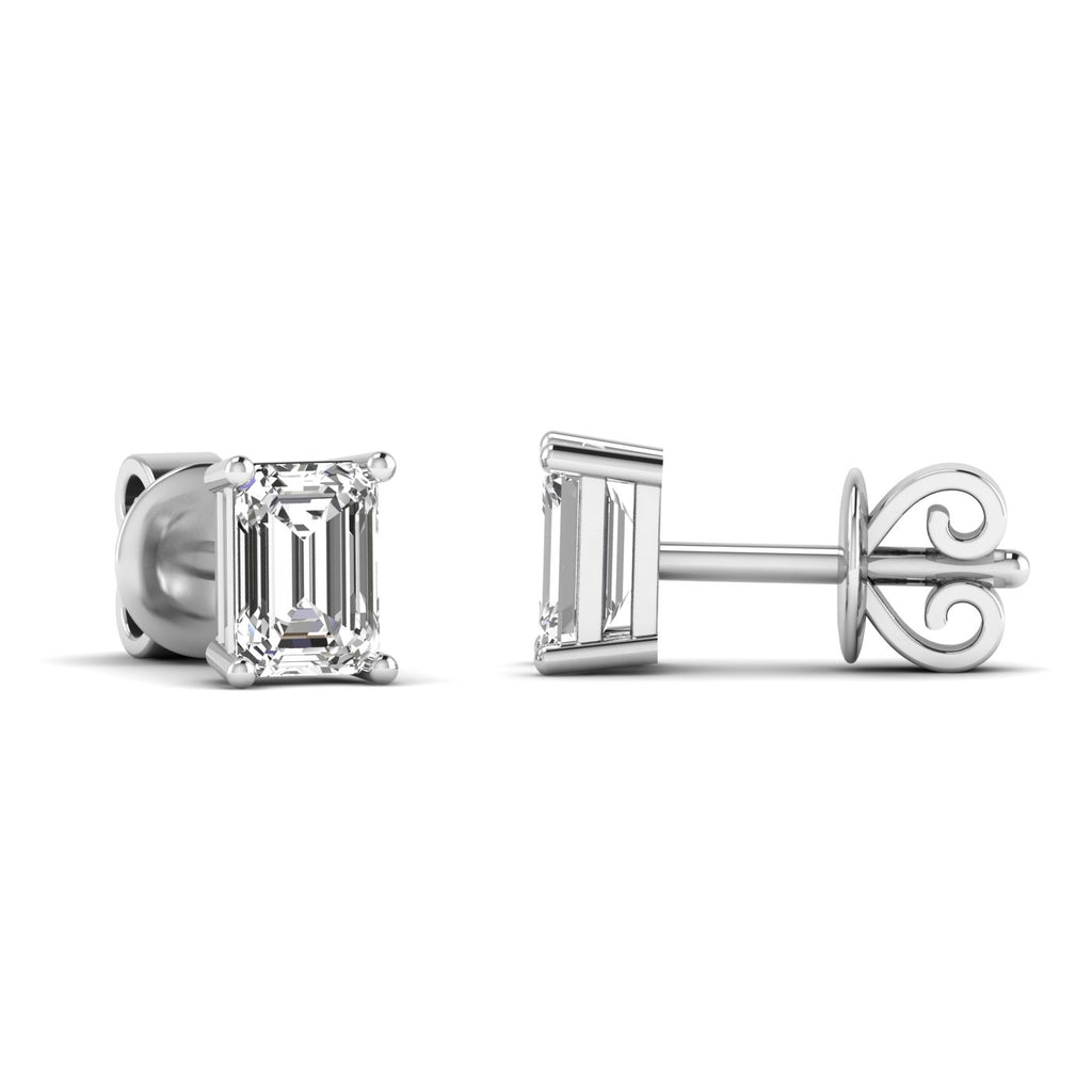 Elegant emerald cut diamond stud earrings featuring timeless, rectangular diamonds set in a sleek metal setting for a sophisticated look | White Gold | Side View