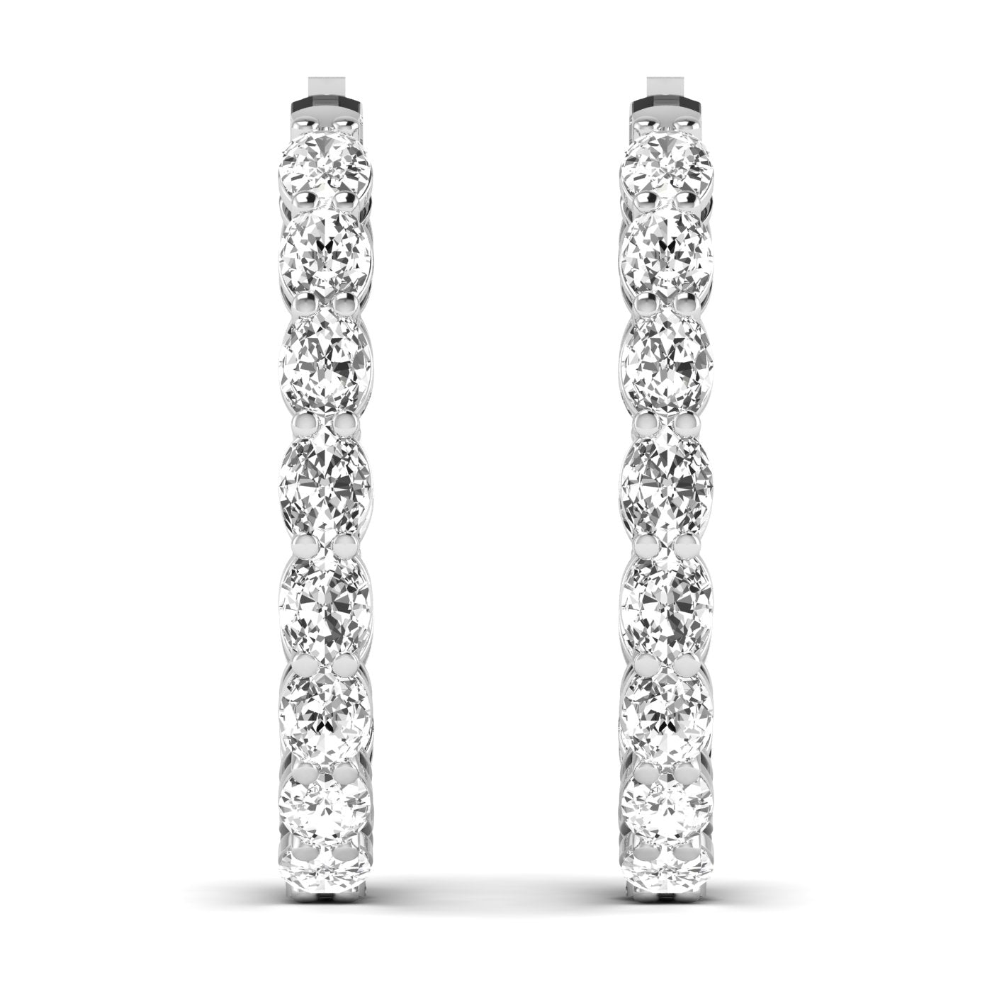 Stunning oval double row diamond hoop earrings featuring two rows of dazzling diamonds set in fine metal, offering a luxurious and eye-catching design | White Gold | Front View