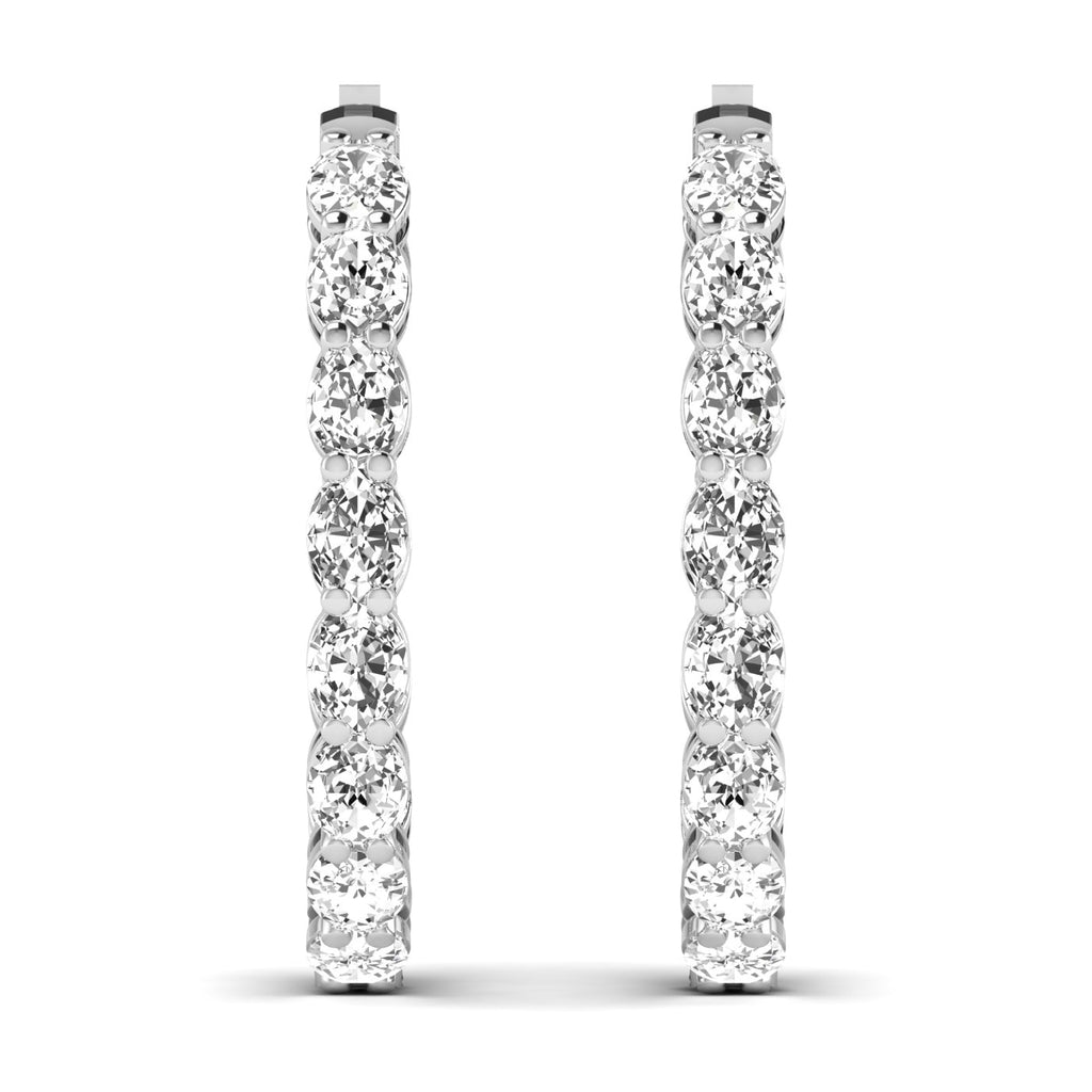 Stunning oval double row diamond hoop earrings featuring two rows of dazzling diamonds set in fine metal, offering a luxurious and eye-catching design | White Gold | Front View