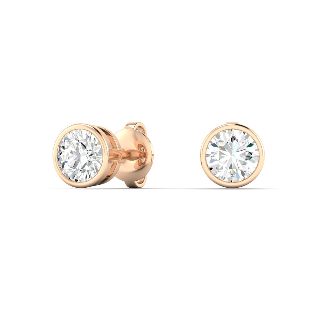 Classic round bezel diamond stud earrings, set in a sleek metal setting for a sophisticated and modern look | Rose Gold | Front View