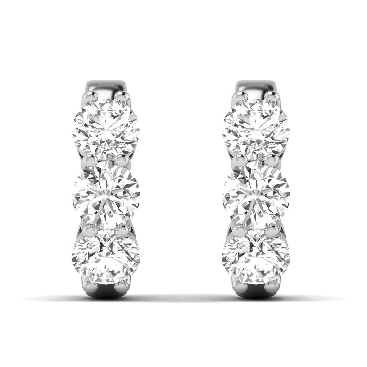 Exquisite Trinity diamond hoop earrings featuring three stunning diamonds set in a sleek hoop design, offering a timeless and elegant look for any occasion | White Gold | Front View