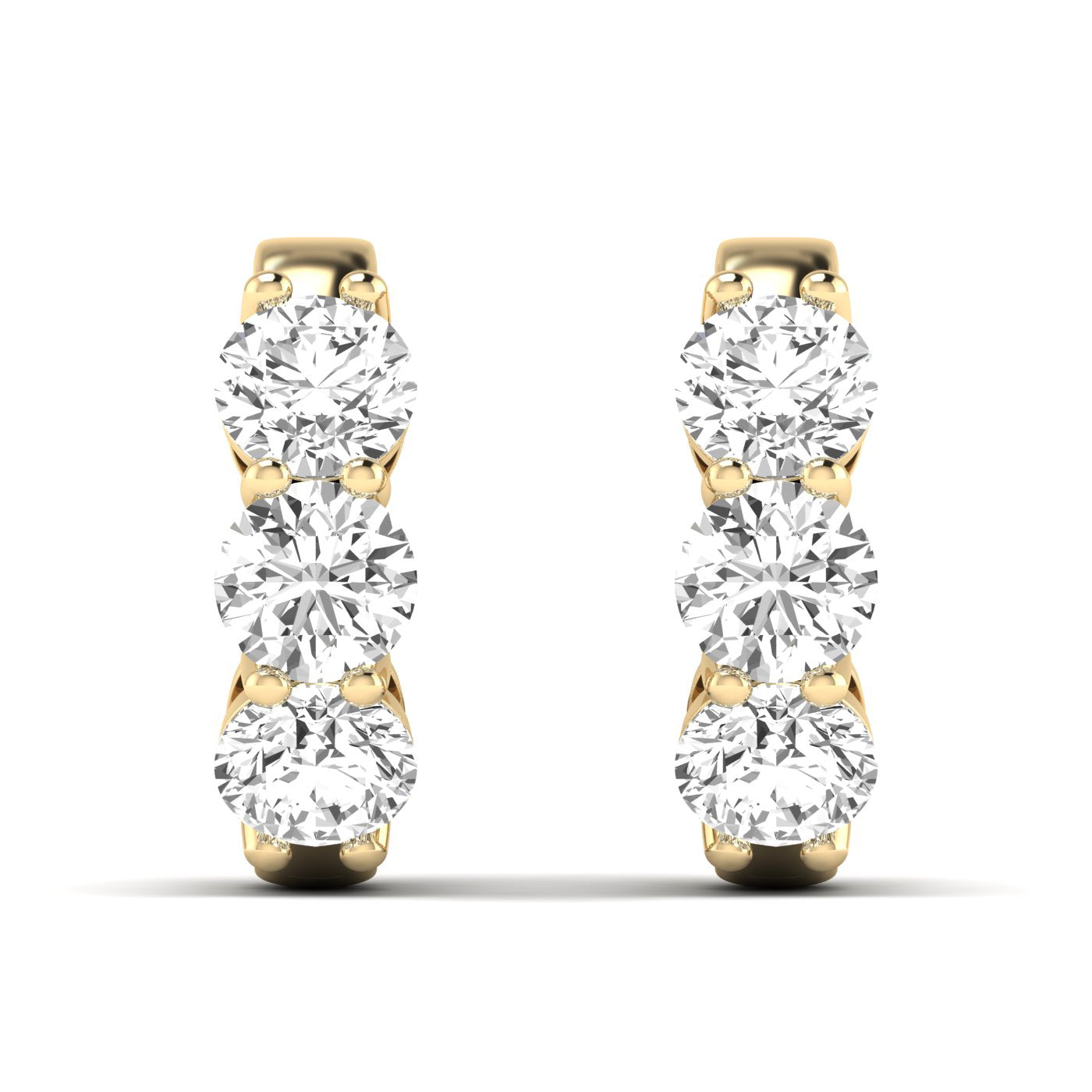 Exquisite Trinity diamond hoop earrings featuring three stunning diamonds set in a sleek hoop design, offering a timeless and elegant look for any occasion | Yellow Gold | Front View