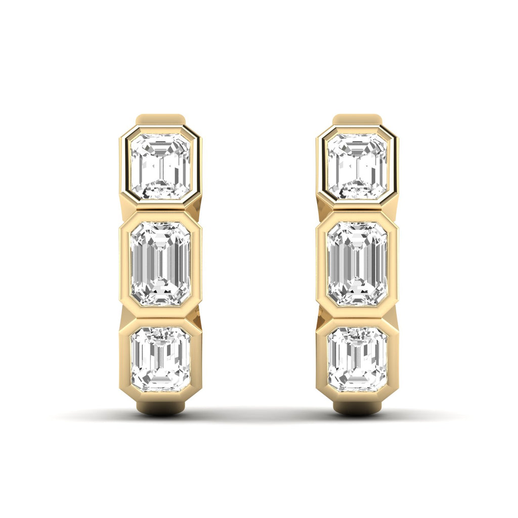 Bold Emerald Cut Bezel Hoop Earrings XL featuring large emerald-cut diamonds set in sleek bezel settings, offering a striking and sophisticated look | Yellow Gold | Front View