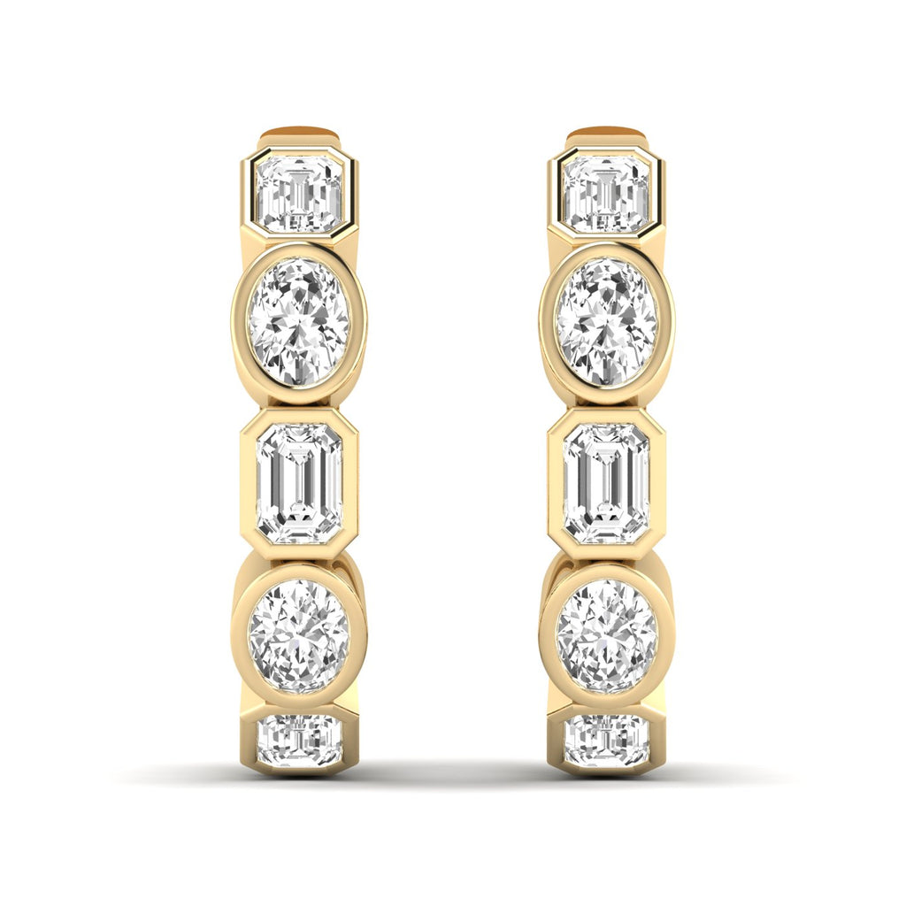 Elegant emerald cut and oval diamond hoop earrings featuring a mix of stunning emerald-cut and oval diamonds, set in high-quality metal for a sophisticated look | Yellow Gold | Front View