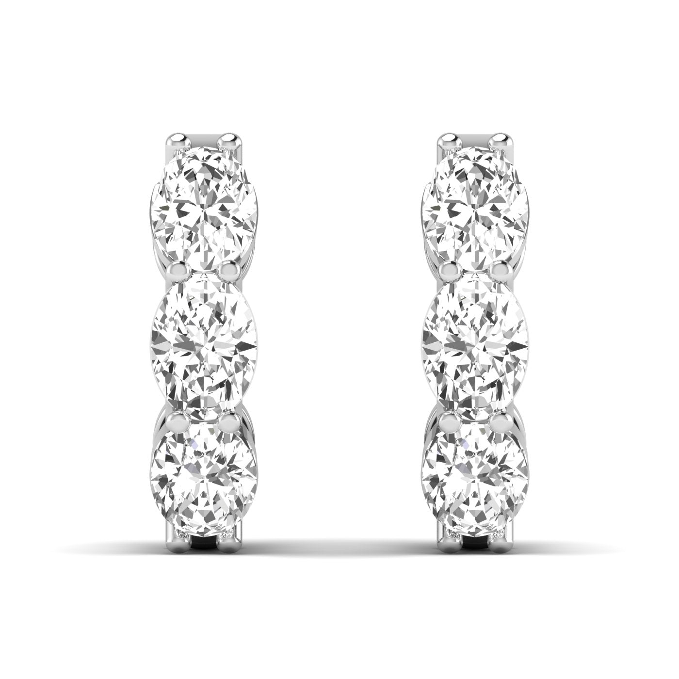 Stunning large oval shared prong diamond earrings featuring radiant oval diamonds set in sleek shared prong settings, offering an elegant and timeless look | White Gold | Front View