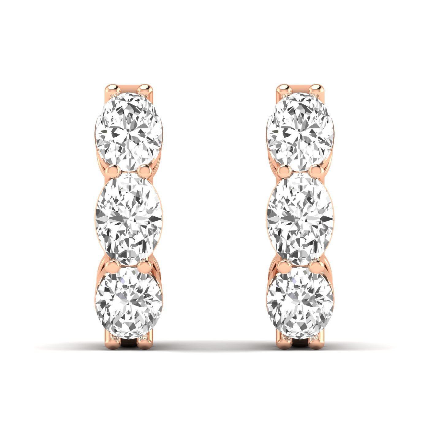 Stunning large oval shared prong diamond earrings featuring radiant oval diamonds set in sleek shared prong settings, offering an elegant and timeless look | Rose Gold | Front View