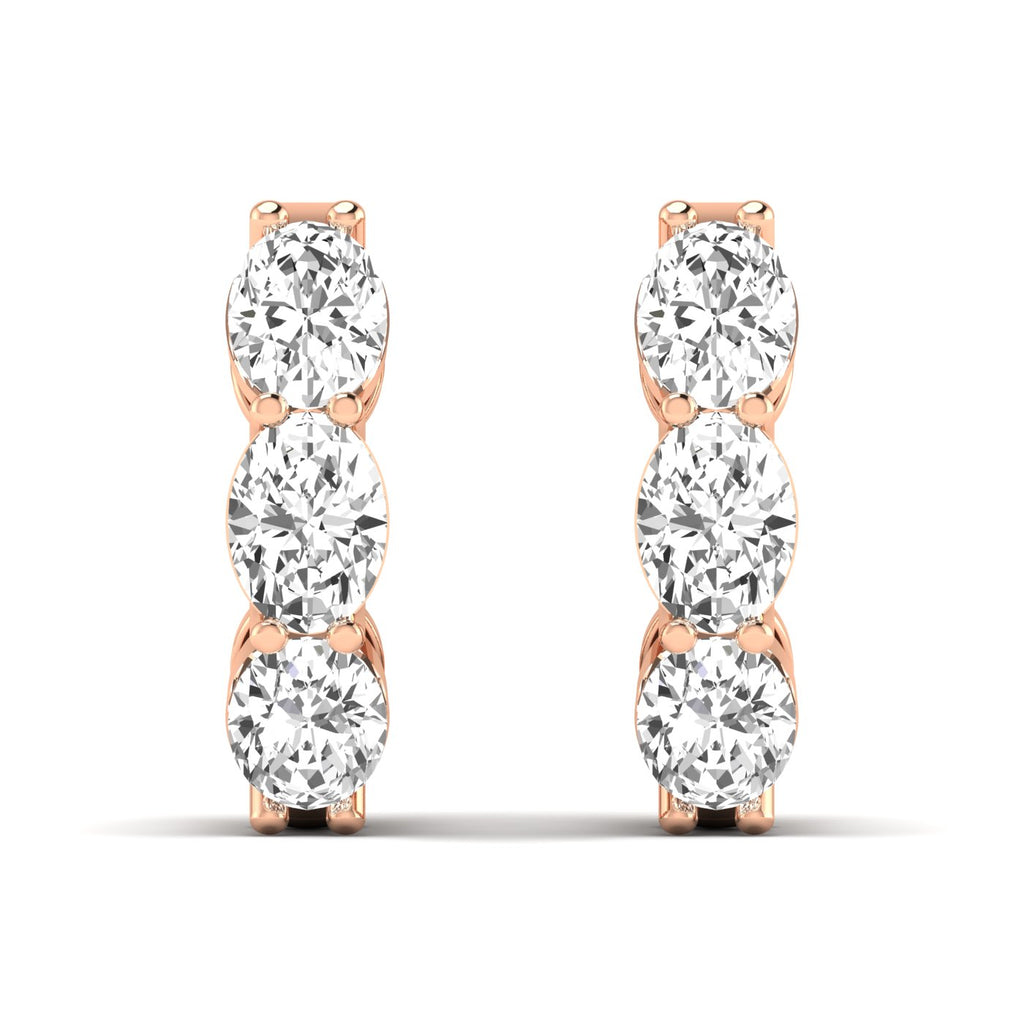 Stunning large oval shared prong diamond earrings featuring radiant oval diamonds set in sleek shared prong settings, offering an elegant and timeless look | Rose Gold | Front View