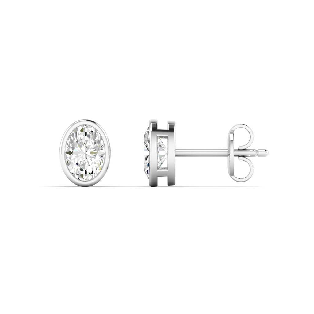 Sophisticated bezel oval diamond stud earrings, featuring a sleek bezel setting that enhances the beauty of the oval-cut diamonds | White Gold | Side View