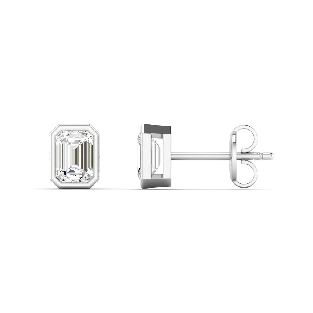 Bezel-set emerald cut diamond stud earrings, featuring sleek and modern design with stunning rectangular diamonds for a sophisticated look | White Gold | Side View