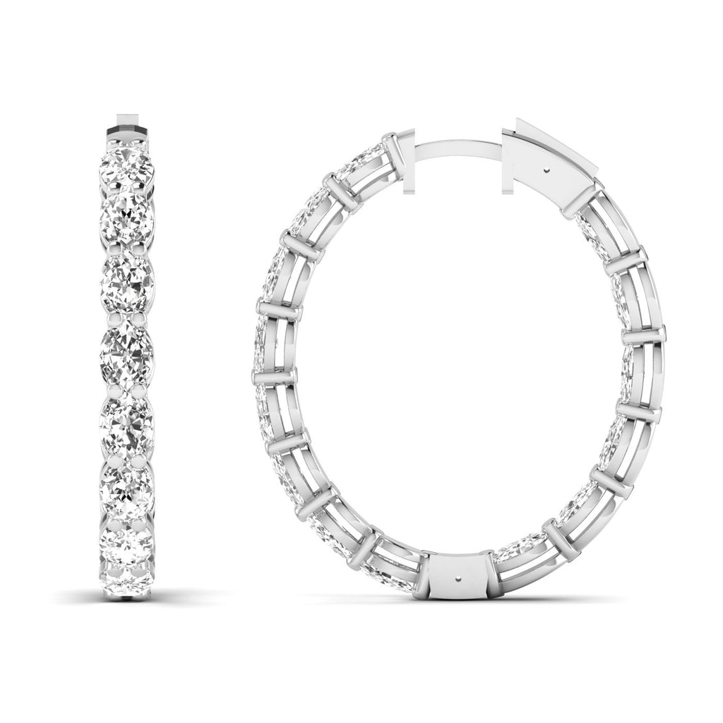 Stunning oval double row diamond hoop earrings featuring two rows of dazzling diamonds set in fine metal, offering a luxurious and eye-catching design | White Gold | Front + Side View