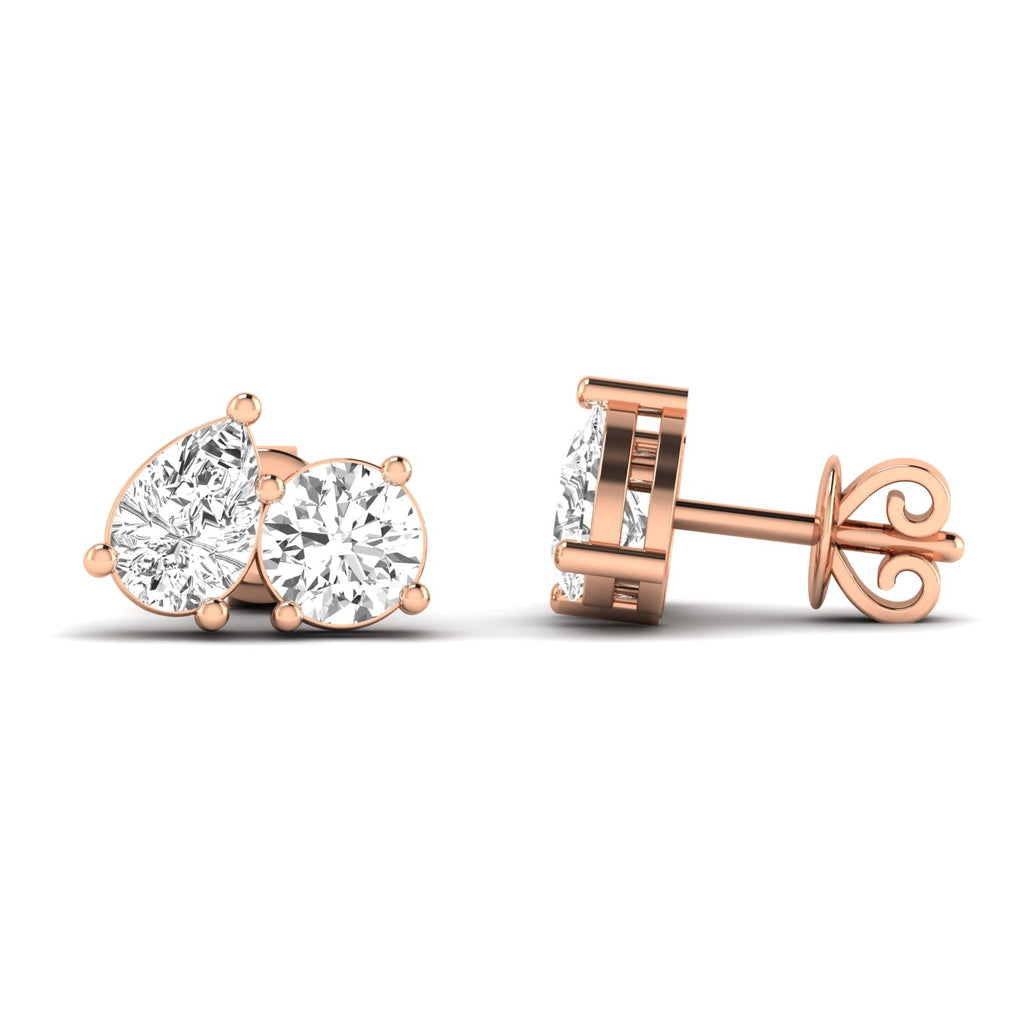 Elegant round and pear diamond Toi et Moi earrings in platinum setting, symbolizing love and unity | Rose Gold | Side View