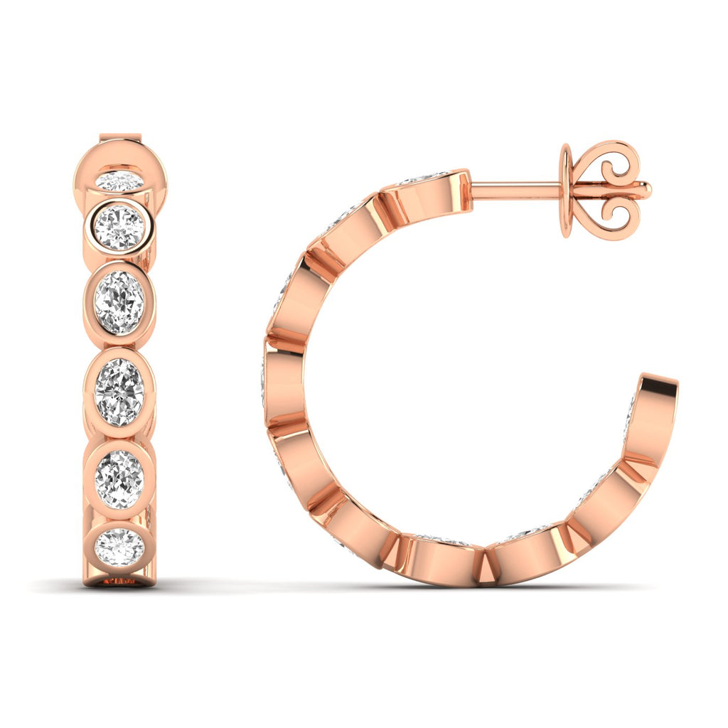 Elegant oval bezel diamond hoop earrings featuring radiant oval diamonds set in sleek bezel settings, offering a modern and sophisticated look | Rose Gold | Front + Side View