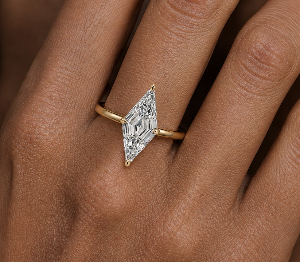Lozenge Cut Diamond Solitaire Engagement Ring Yellow Gold Hand