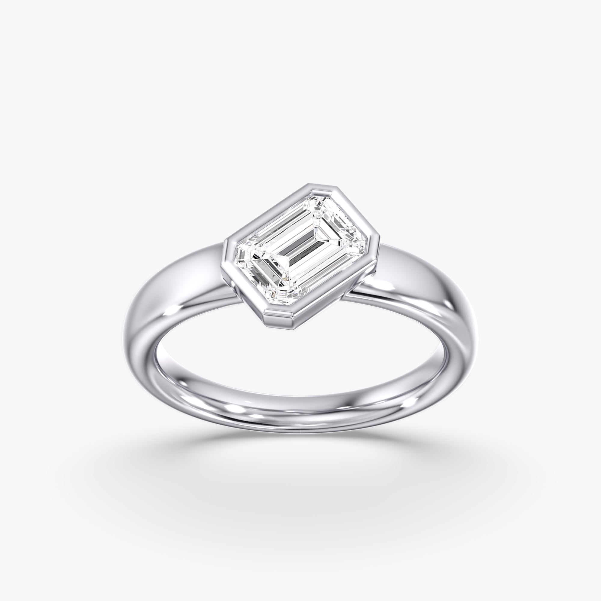Modern Tilted Emerald Cut Diamond Bezel Ring 