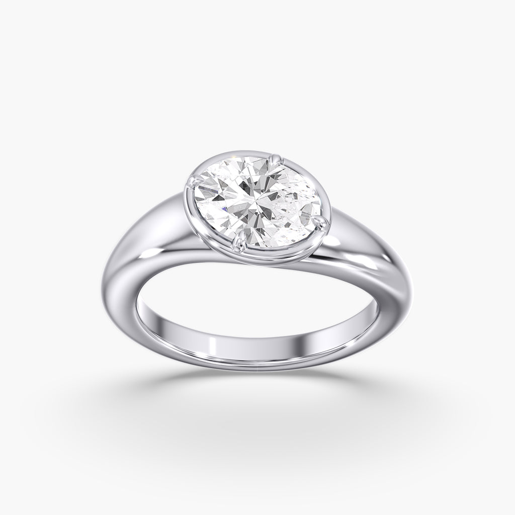Modern Tilted Oval Diamond Bezel Ring