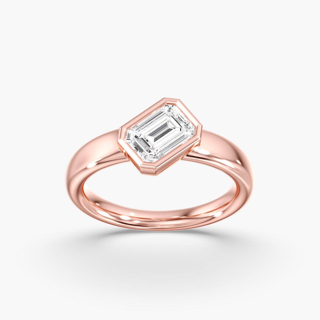 Rose Gold Modern Tilted Emerald Cut Diamond Bezel Ring