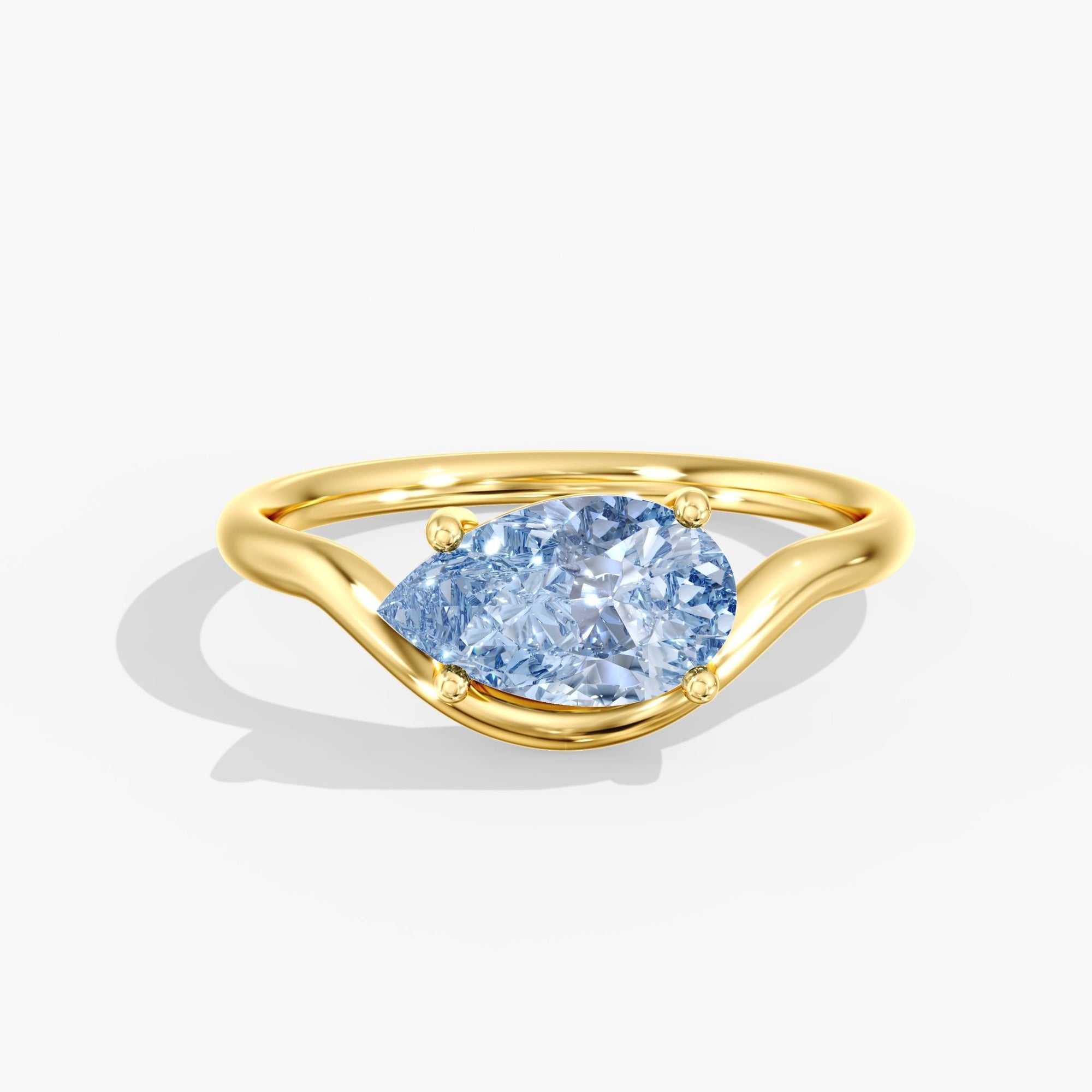 Yellow Gold Blue Pear Diamond East West Ring Front View