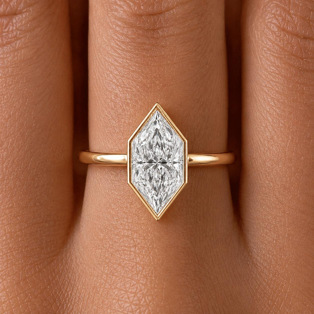 dutch marquise lab diamond bezel engagement ring on hand