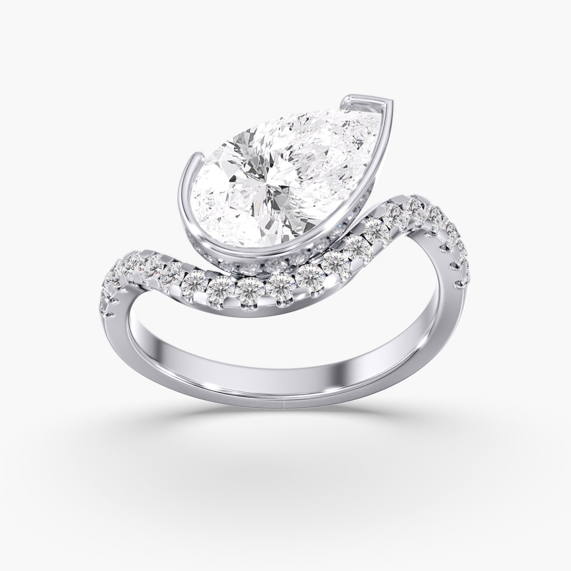 East West Pear Diamonds Tilted Bezel Pave Ring