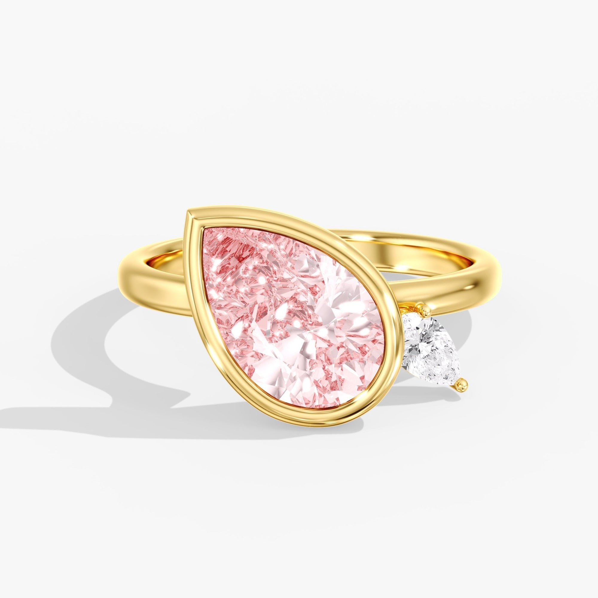 Yellow Gold Fancy Pink Pear Diamond Modern Tilted Bezel Ring Top View
