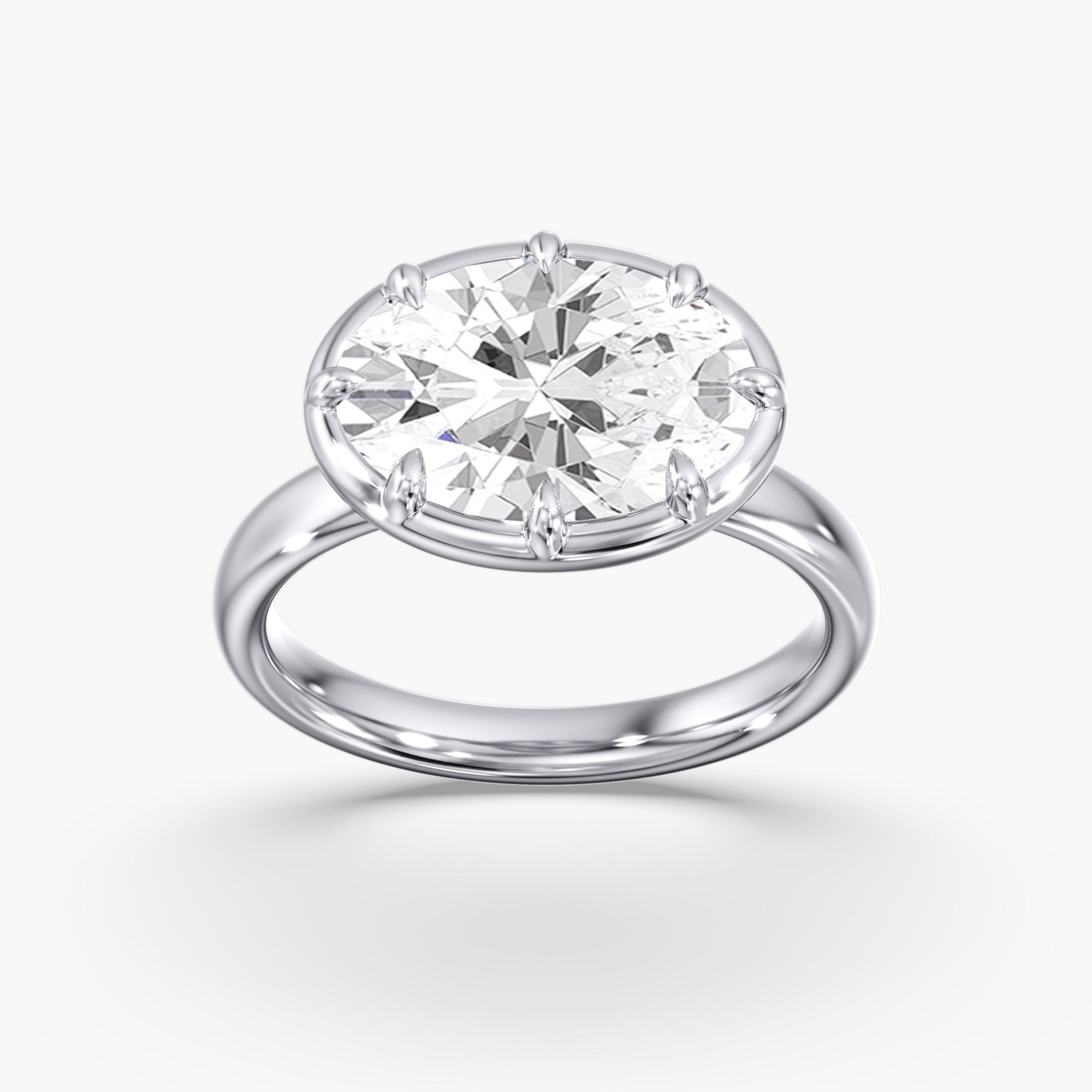 Modern East West Oval Diamond Bezel Ring