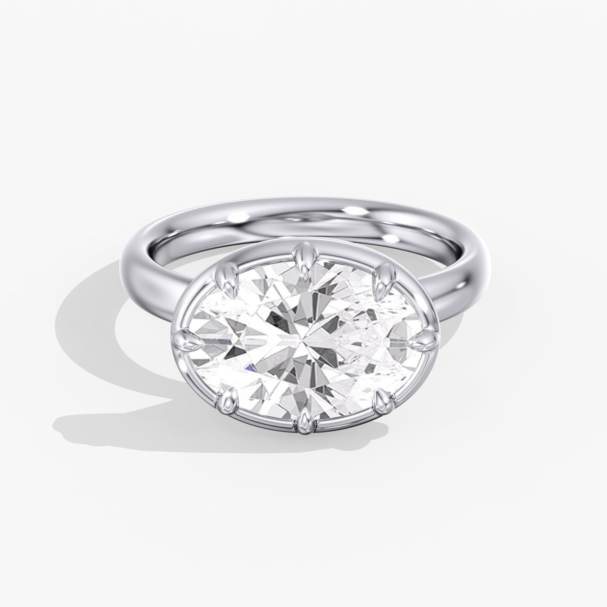 Modern East West Oval Diamond Bezel Ring Front View