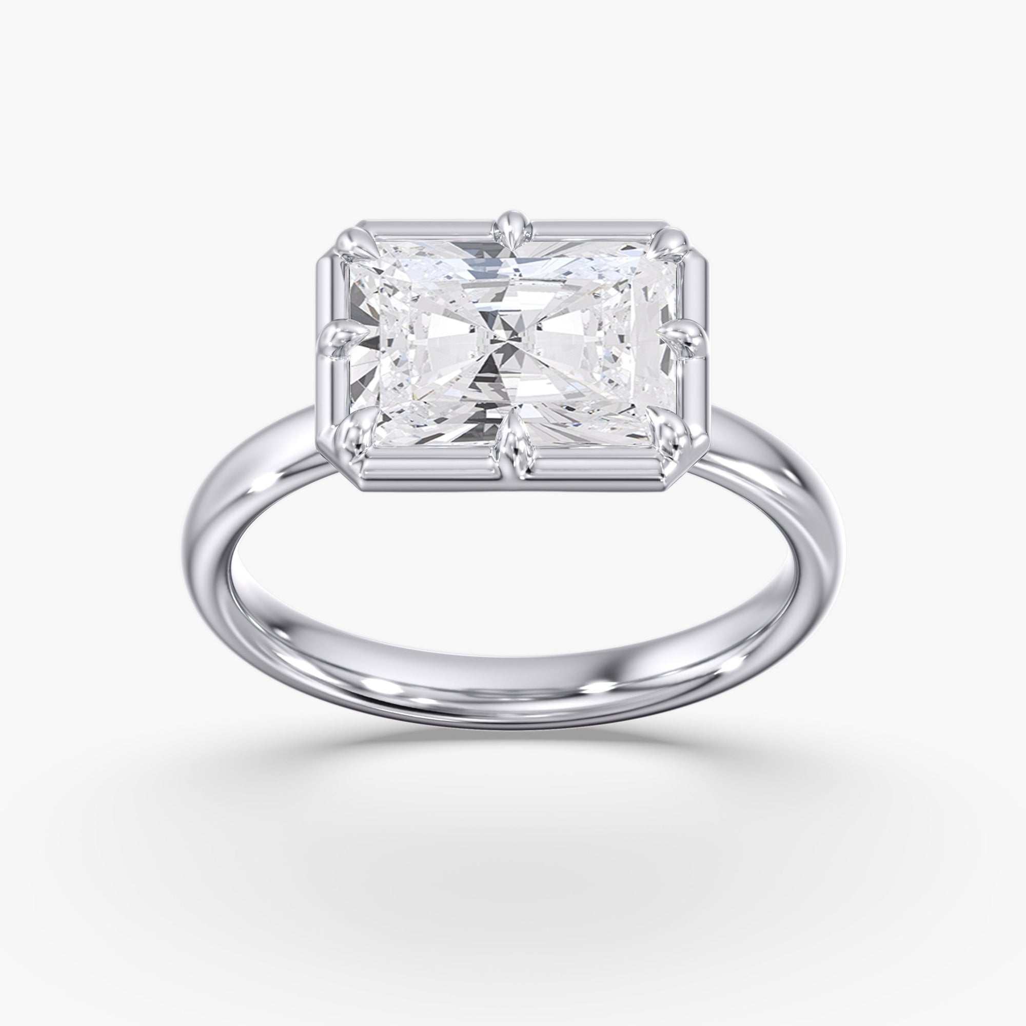 Modern East West Radiant Diamond Bezel Ring