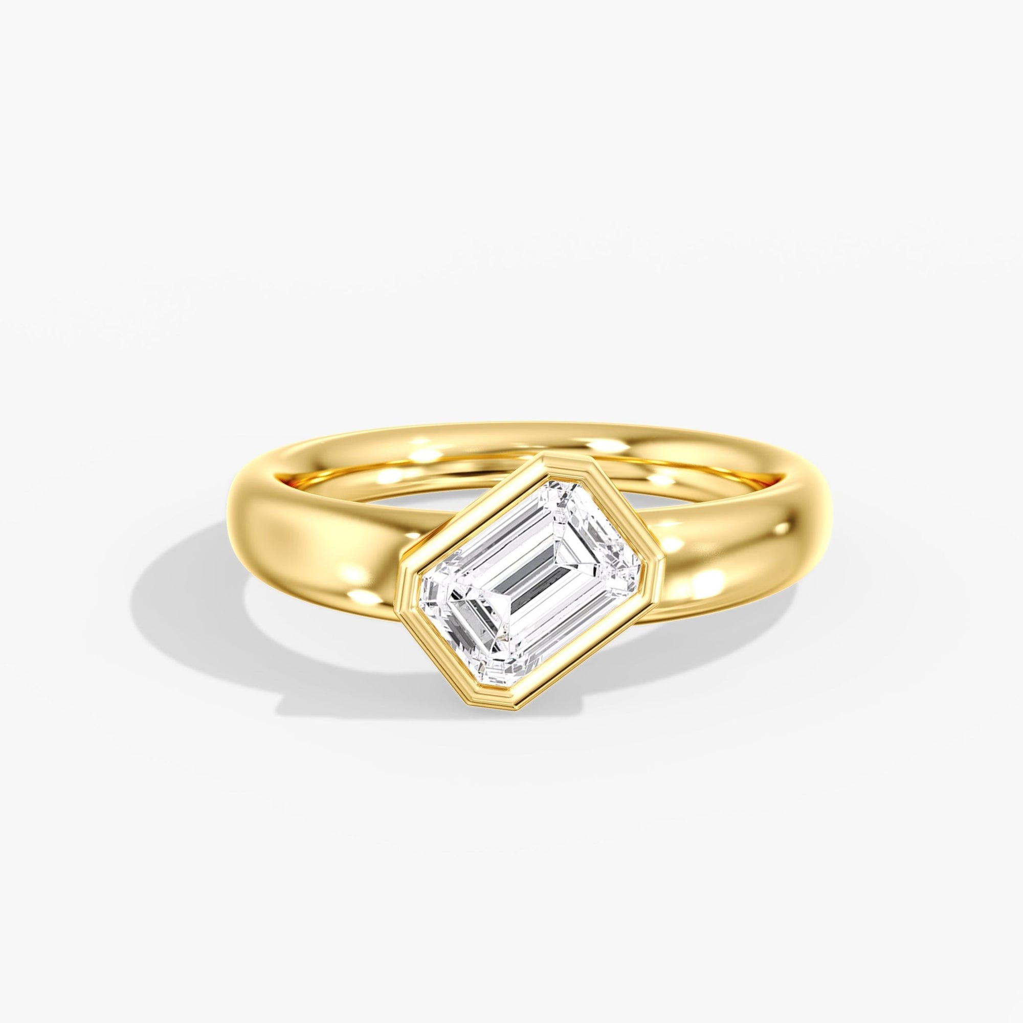 Yellow Gold Modern Tilted Emerald Cut Diamond Bezel Ring Front View