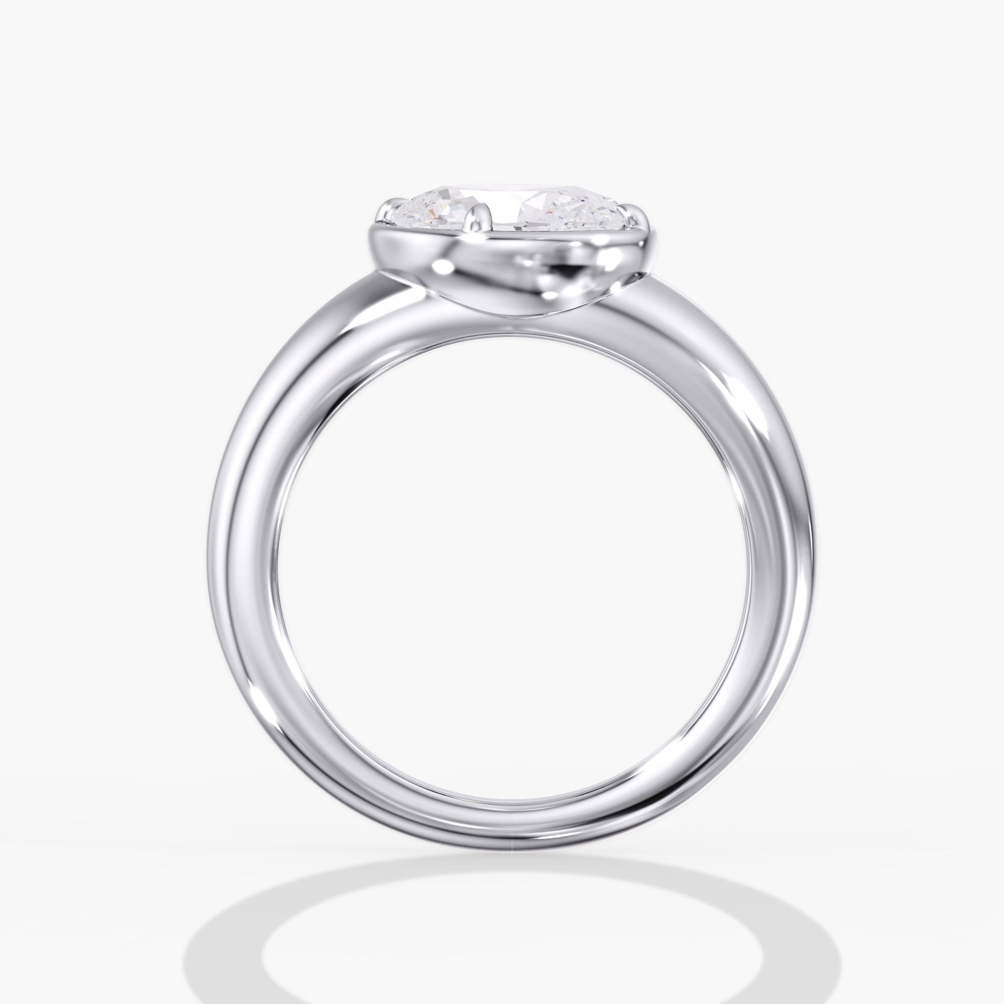Modern Tilted Oval Diamond Bezel Ring Side View