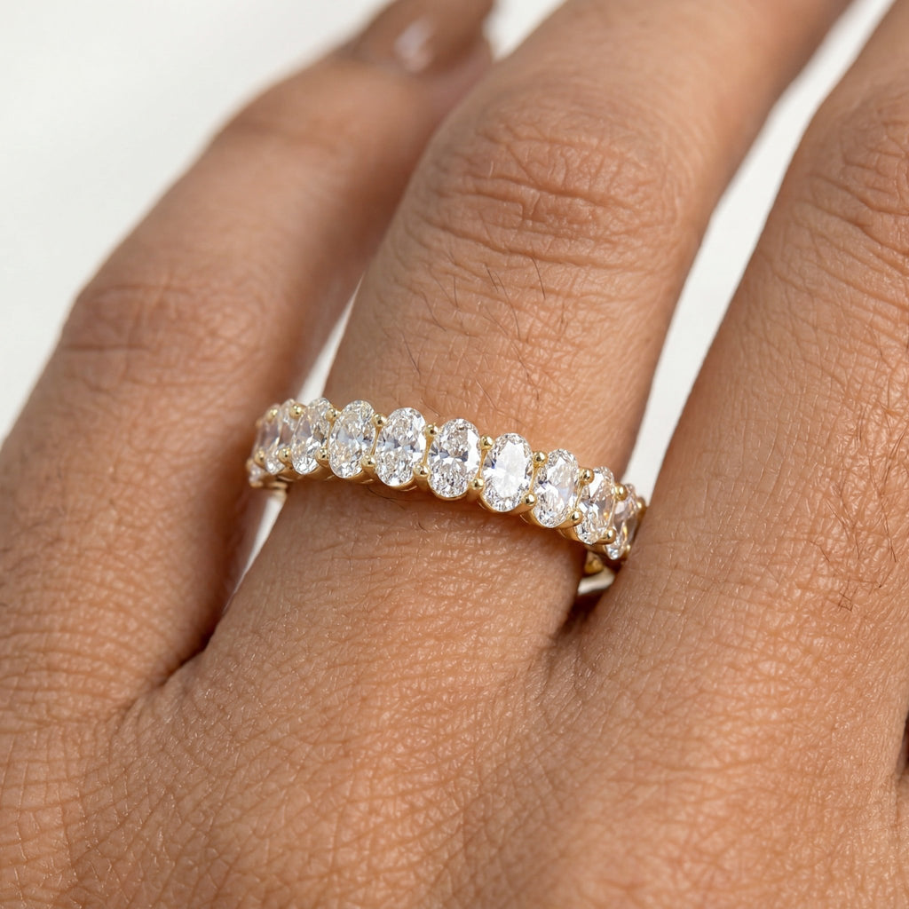 Yellow Gold Oval Diamond Shared Prong Wedding Band Hand View
