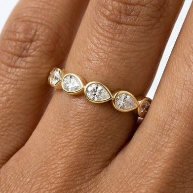 Yellow Gold Pear Diamond Bezel Curved Wedding Band On Hand 
