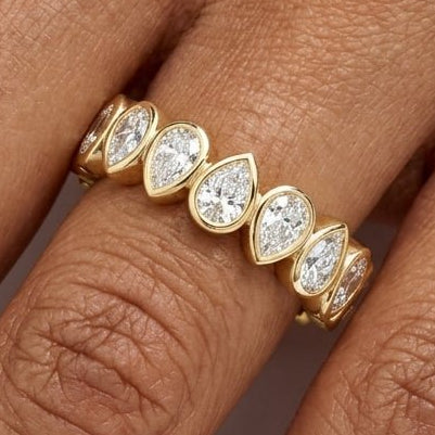 Yellow Gold Pear Diamond Bezel Eternity Band On Hand 
