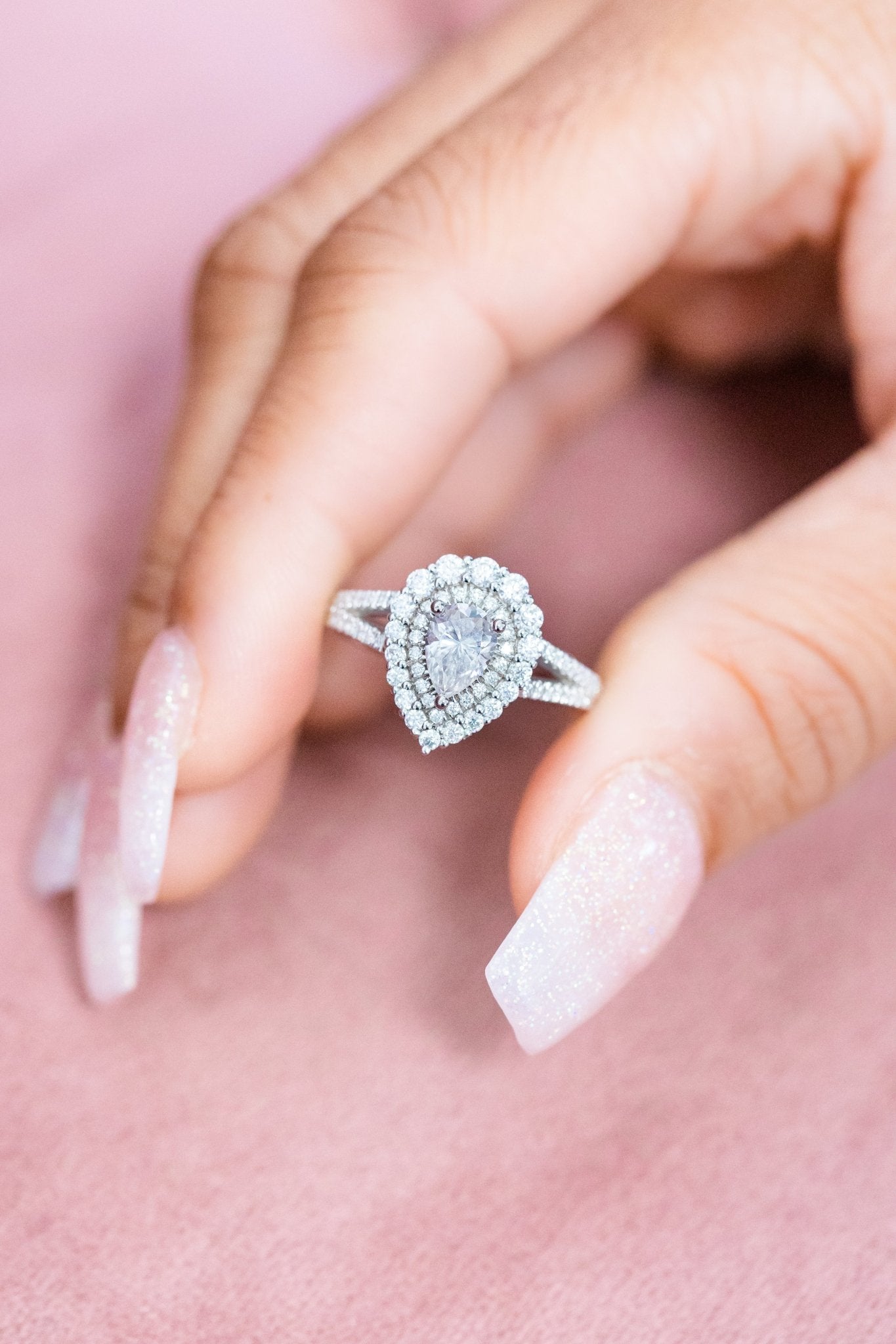 pear natural diamond engagement ring