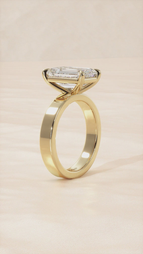 Gold Emerald Cut Diamond Cigar Solitaire Engagement Ring
