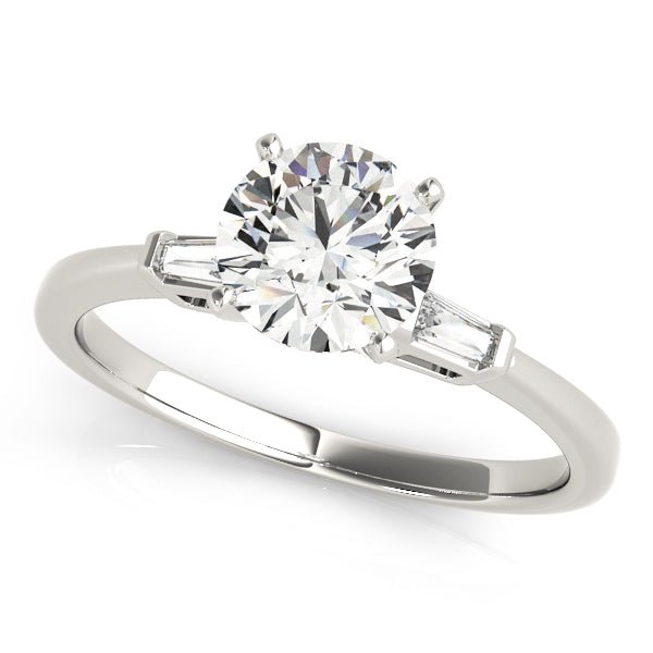 round diamond ring with baguette side stones