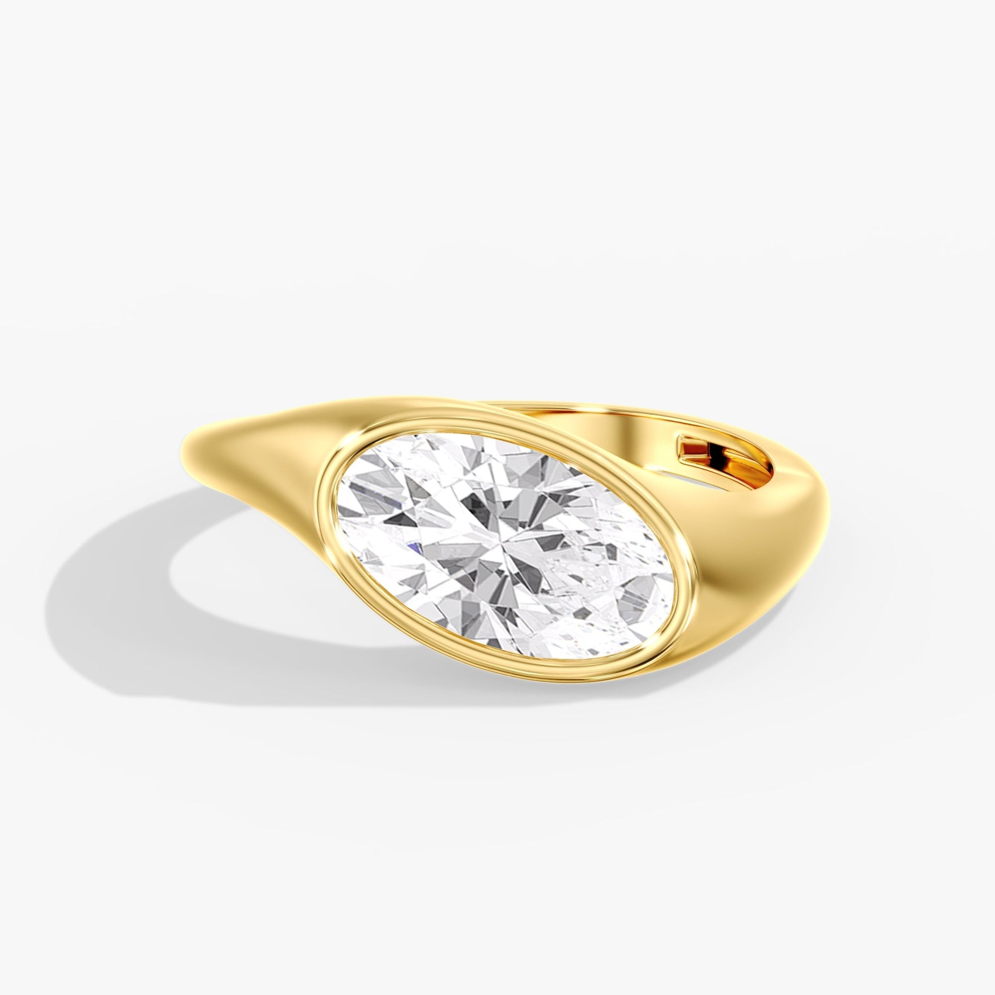 Yellow Gold Tilted East West Chunky Bezel Oval Ring Front View