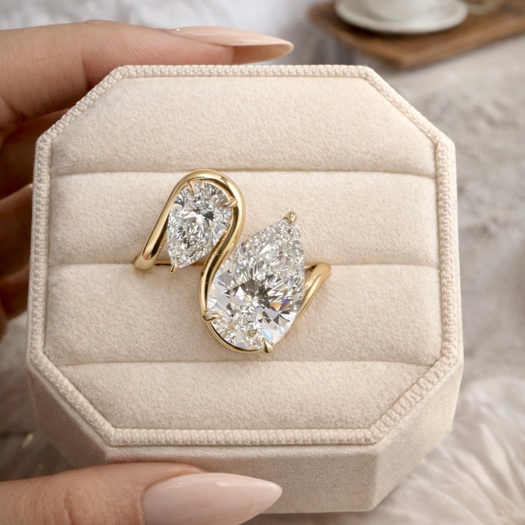 Unique pear diamond engagement ring 